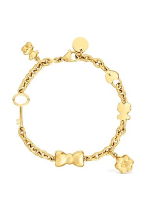 Bracciale a catena in oro con ciondoli tra cui un orsetto, una chiave, un fiocco, un lucchetto a forma di cuore, due orsi e un fiore.