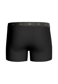 Black boxer shorts made of soft fabric, featuring a reinforced elastic waistband with a subtle logo pattern. Smooth texture.