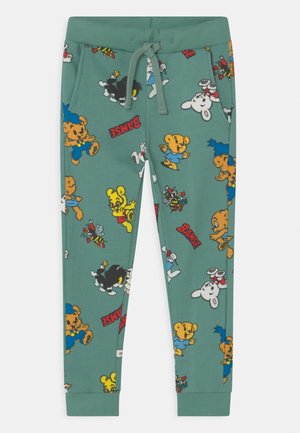 TROUSERS BAMSE - Tracksuit bottoms - light turquoise