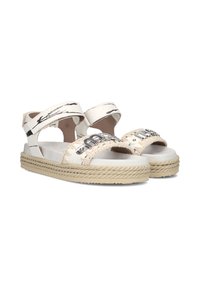 Sandali bianchi con suola in juta intrecciata, cinturini regolabili e dettagli in metallo. Finitura liscia con sottili accenti neri.