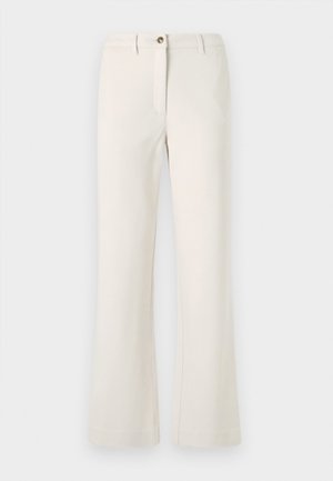 Beige színű, flared lábú nadrág, sima anyagból készült. Egyetlen elülső gombbal és cipzárral záródik, övhurkokkal rendelkezik.