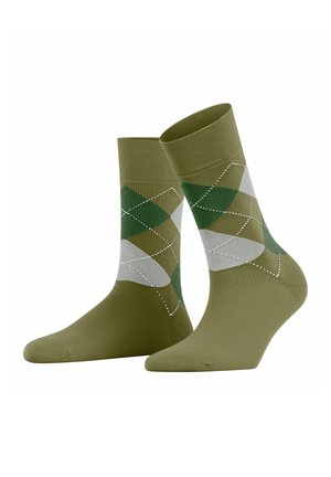 Grüne und graue Argyle-Muster-Socken mit einem gerippten Bund. Sanfte Textur, knielang, mit weißem Nähen entlang der Rautenformen.