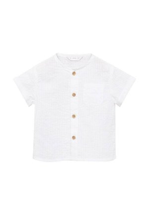 Camicia bianca a maniche corte con tessuto strutturato, colletto rotondo, taschino frontale e cinque bottoni in legno lungo la parte anteriore.