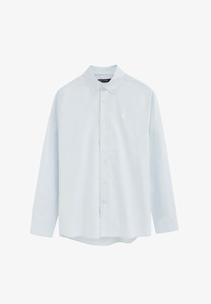 Chemise bleu clair à manches longues, boutonnée à l'avant, avec col boutonné et petit logo brodé sur la poitrine.