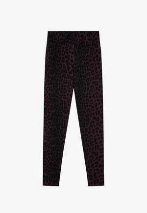 Black leggings with a subtle leopard print pattern in dark brown, featuring a soft fabric and an elastic waistband for comfort.