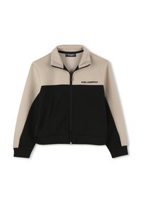 Veste zippée avec un design coloré en beige et noir. Fabriquée en tissu doux, avec un col montant et un logo brodé.