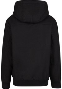 Sudadera negra con un acabado texturizado, que presenta una capucha con cordón, puños acanalados y dobladillo. Los detalles de costura realzan el diseño.