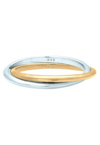 To interlocking ringe; den ene sølvfarvet, den anden guldfarvet. Glat, poleret overflade. Mærker på den indvendige side antyder renhed.