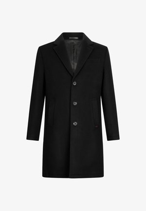 Zwarte wollen jas met een reverskraag met inkeping, drie knopen aan de voorkant, twee zijzakken en één borstzak. Gladde binnenvoering.