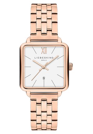 Square-faced wristwatch with a white dial. Rose gold metal strap features interlocking links. Clear hour markers and date display at 6 o'clock.