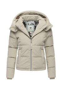 Beige pufferjakke med en tekstureret overflade, lynlås foran og hætte. Indvendigt har den et camouflage-mønster. Sidelommer er inkluderet.
