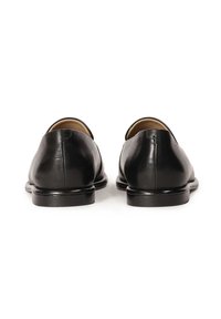 Black leather shoes with a smooth texture, rounded back design, and low heel. Lined interior and subtle stitching detail visible.