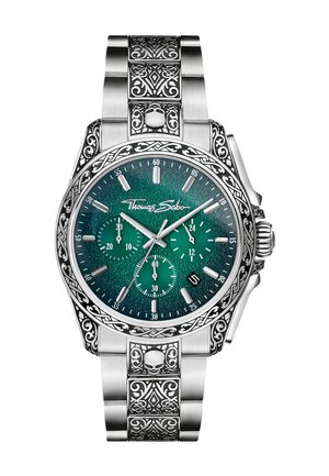 Silberne Edelstahluhr mit filigranen Designs am Armband. Dunkelgrünes, gemustertes Zifferblatt mit drei Unterzifferblättern und silbernen Stundenmarkierungen.