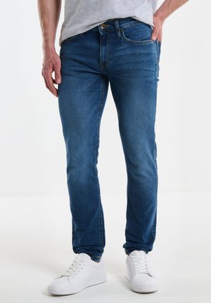 DERIC - Slim fit jeans - blau