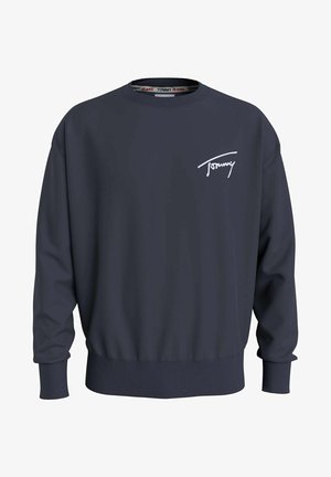 Ciemnoniebieska bluza crewneck z prążkowanymi mankietami i dołem, z małym białym logo "Tommy" na lewej piersi oraz "Tommy Jeans" wewnątrz kołnierza.