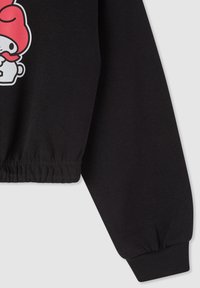 Felpa nera con orlo e polsini a coste, caratterizzata da una stampa grafica di un personaggio con un cappello rosso e baffi sul davanti.