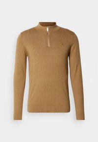 Pullover marrone a maniche lunghe con colletto alto e mezza zip. Texture liscia con un piccolo logo impresso sul petto.