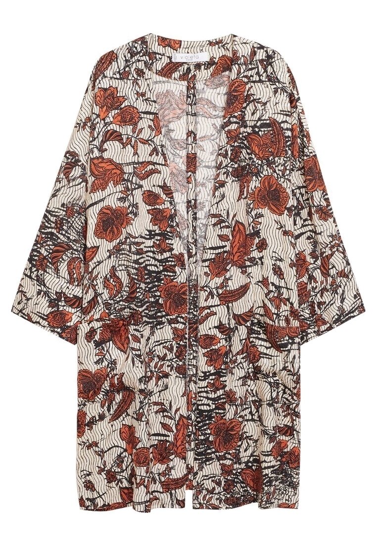 Long kimono ouvert sur le devant, manches larges, couleur de base crème et motif floral orange et noir sur l'ensemble.