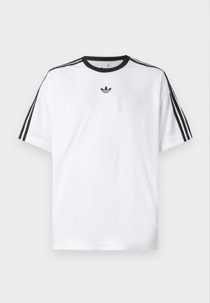 White T-shirt made of cotton, featuring a black round neckline and three black stripes on each shoulder. Small black logo on the chest.