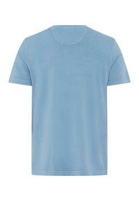 Lyseblå, kortærmet t-shirt lavet af blødt stof. Har en klassisk rund halsudskæring og pæne syninger på sømmene.