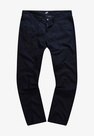 Tummansinisiä puuvillachinoshousuja, joissa on kapea malli, vetoketjukiinnitys, nappisulku ja viisi taskua. Sileä kangas, jossa on vähäisiä ompeluyksityiskohtia.