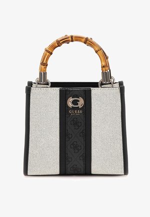 Black and white handbag with a textured mesh body, solid black side panels, bamboo handle, and a silver logo accent on the front.
