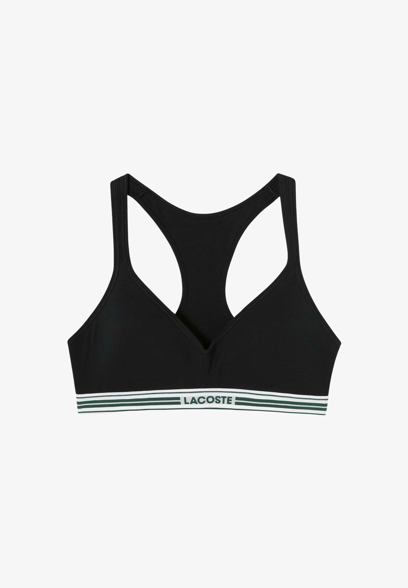 Sottoacqua nera con scollatura a V e spalline ampie stile racerback. Presenta un cinturino a strisce verdi e bianche con il logo "LACOSTE". Texture liscia.