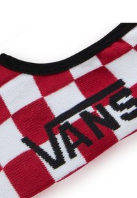 Rød- og hvidternet stof med et sort "VANS" logo. Materialet er vævet med en rund sort kant langs kanten.