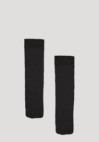 Knæ-høje sorte netstrømper med ribbet top, som har et tekstureret mønster og en glat finish. Velegnet til forskellige stilarter og anledninger.