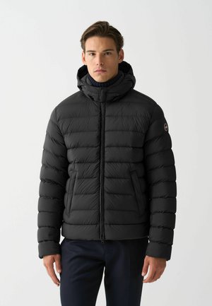 Black puffer jacket with a hood, featuring a quilted design, zip closure, and side pockets. Smooth texture with a sleek silhouette.