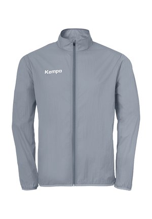 Lysegrå sportstrøje med lynlås, lange ærmer og "Kempa" logo på venstre bryst, med en ståkrave og elastiske manchetter.