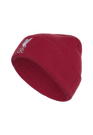 Bonnet tricoté marron avec logo blanc du Liverpool FC brodé sur le revers, isolé sur fond blanc.