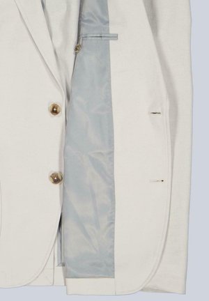 Beiger Blazer mit zwei braunen Knöpfen, der hellblaue Innenfutter und genähte Knopflöcher auf der rechten Seite zeigt.