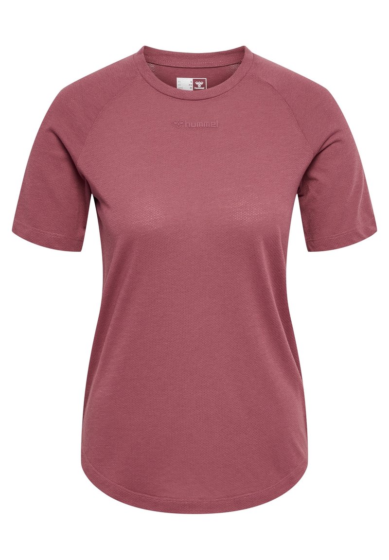 Kortärmad t-shirt med rund hals i en dämpad rosafärg. Tillverkad av texturerat tyg med en subtil logotyp på framsidan. Har raglanärmar.