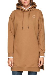 Sudadera con capucha en mezcla de algodón marrón, con un pequeño diseño de cara sonriente blanca en el pecho y aberturas laterales en el dobladillo.