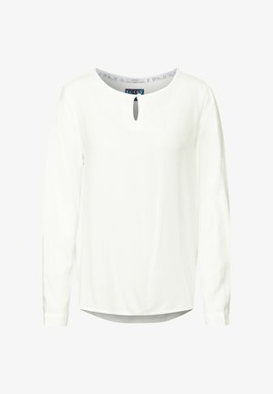 Biała bluzka z długim rękawem, okrągłym dekoltem i otworem w kształcie łezki z przodu. Wykonana z teksturowanej tkaniny, o lekko luźnym kroju.