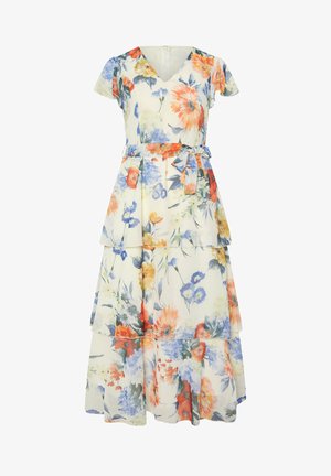 Blomstret midi-kjole med lag på lag, korte ærmer, V-hals og bindebånd i taljen, med orange, blå og gule blomster på hvid baggrund.