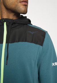 Mizuno ATHLETIC JACKET - Camisola com fecho - tapestry