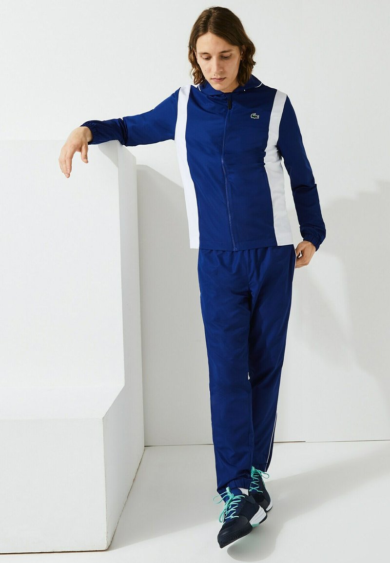tuta lacoste donna