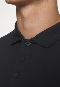 Calvin Klein Golf NEWPORT  - Polokošeľa - black