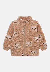 Brown fleece jacket with a soft texture, featuring a zip closure and a pattern of light-colored animal faces. Long sleeves with cuffs.