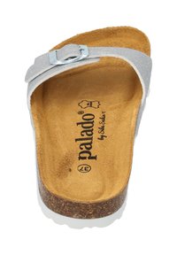 Gray slip-on sandal with a textured upper, adjustable silver buckle, suede-like insole, and cork midsole, featuring a white rubber outsole.