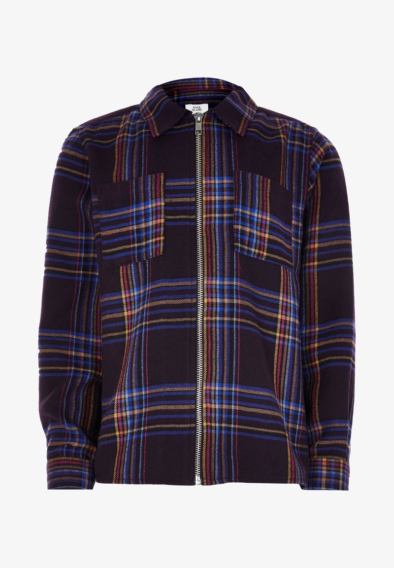 Chemise zippée à carreaux foncés avec des rayures bleues, rouges et jaunes, deux poches poitrine, manches longues et col.