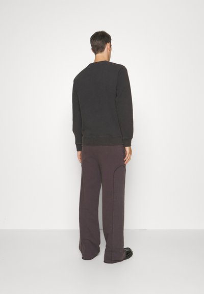 Études Felpa - black