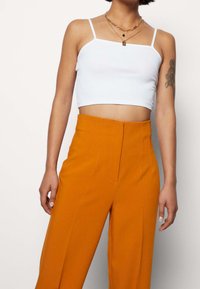 b.young Tygbyxor - dark yellow