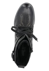 Bottine en cuir noir à bout rond, avec un laçage à l'avant, une fermeture éclair et des détails texturés sur la tige. Doublure intérieure douce visible.