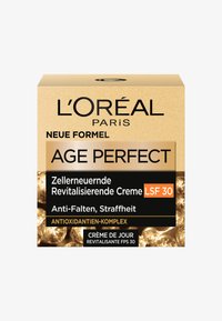 L'Oréal Paris Age Perfect föryngrande krämförpackning, guld- och svartdesign med tysk text, har ett cirkulärt mönster och SPF 30-notation.