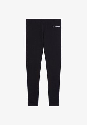 Leggings noirs en tissu extensible, avec une coupe ajustée et un petit logo blanc sur le haut à gauche.