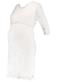 Robe de maternité en dentelle blanche avec un décolleté en V et des manches trois-quarts. Caractéristiques : corsage ajusté, longueur au-dessus du genou et ourlet en dents de scie.