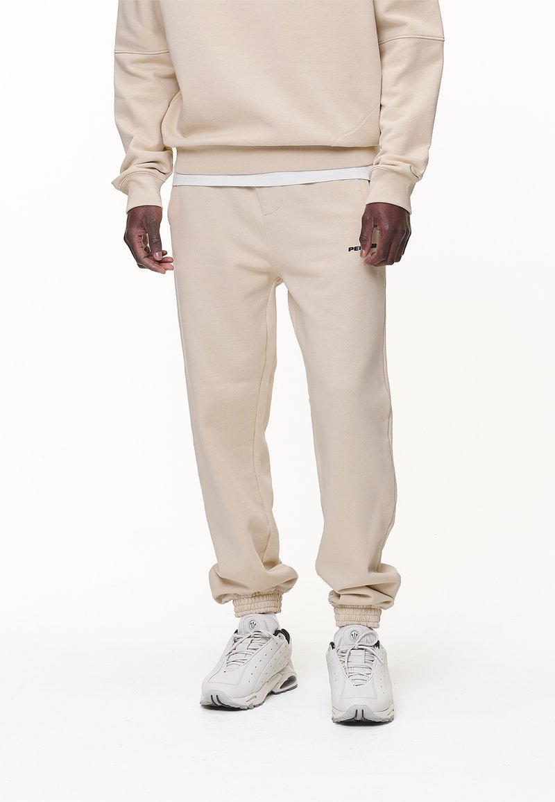Pegador LOGO JOGGER - Tréningruha alsók - washed desert sand/black gum